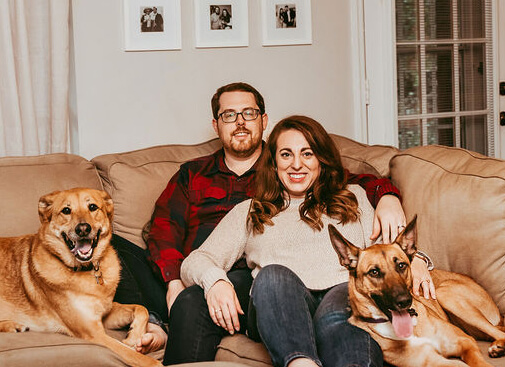 Brittany Ivey with her husband and two dogs.